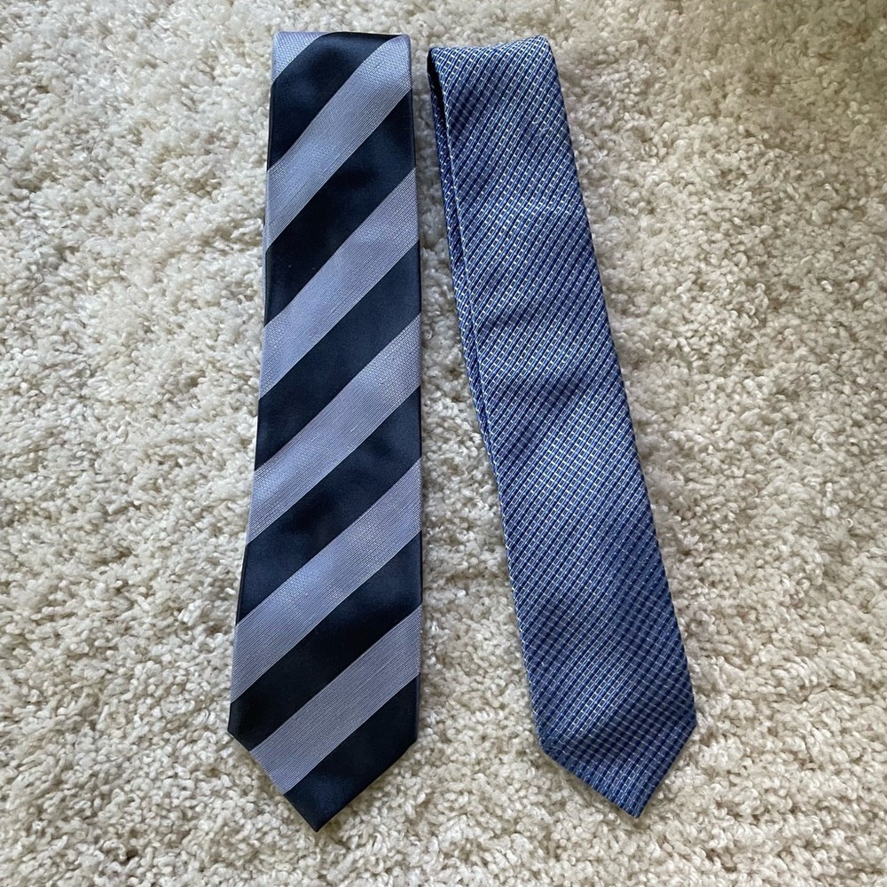 Two men’s ties. One Michael Kors. Excellent condition
